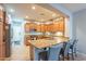 Modern kitchen with granite countertops and wooden cabinets at 28731 N 20Th Ln, Phoenix, AZ 85085