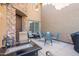 Private patio with seating area and fire pit at 28731 N 20Th Ln, Phoenix, AZ 85085