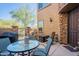 Private patio with seating and a fire pit at 28731 N 20Th Ln, Phoenix, AZ 85085