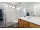 Clean bathroom featuring a bathtub, shower, and a light wood vanity with sink at 29050 N Mountain View Rd, San Tan Valley, AZ 85143