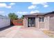 Private backyard with a large gate and paved parking area at 2917 N 8Th Ave, Phoenix, AZ 85013