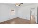 Bright bedroom featuring wood-look floors and ceiling fan at 2917 N 8Th Ave, Phoenix, AZ 85013