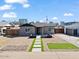 Modern house exterior with gray brick, landscaping, and walkway at 2917 N 8Th Ave, Phoenix, AZ 85013