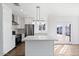 Renovated kitchen with stainless steel appliances and white shaker cabinets at 2917 N 8Th Ave, Phoenix, AZ 85013