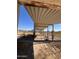 View of the property's metal awning structure, offering shade in the desert sun at 29967 N Sandridge Dr, Queen Creek, AZ 85144