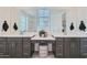 Double vanity bathroom with modern dark brown cabinets at 3344 S 82Nd St, Mesa, AZ 85212