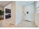 Bright and airy entryway with tile flooring and a view into the kitchen at 3344 S 82Nd St, Mesa, AZ 85212