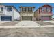 Three-story townhouses with attached garages and neutral color palettes at 3344 S 82Nd St, Mesa, AZ 85212