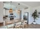 Modern kitchen with white cabinets and island with seating at 3346 S 82Nd St, Mesa, AZ 85212