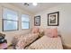 Bedroom with two twin beds and floral bedding at 34457 N Legend Trail Pkwy # 1018, Scottsdale, AZ 85262