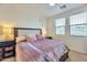 Main bedroom with a king size bed and plenty of natural light at 34457 N Legend Trail Pkwy # 1018, Scottsdale, AZ 85262