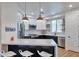 Modern kitchen with white and dark cabinets, quartz countertops at 34457 N Legend Trail Pkwy # 1018, Scottsdale, AZ 85262