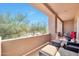 Relaxing patio with seating area and desert views at 34457 N Legend Trail Pkwy # 1018, Scottsdale, AZ 85262