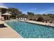 Relaxing pool area with plenty of lounge chairs at 34457 N Legend Trail Pkwy # 1018, Scottsdale, AZ 85262