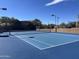 Newly resurfaced tennis court with modern net at 34457 N Legend Trail Pkwy # 1018, Scottsdale, AZ 85262