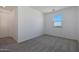 Well-lit bedroom with neutral walls and carpet at 34690 N Ashwood Dr, San Tan Valley, AZ 85144