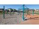 Modern playground with climbing structures and safety surface at 34690 N Ashwood Dr, San Tan Valley, AZ 85144