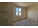 Unfinished bedroom with a window and drywall at 37749 N Cowboy Ln, San Tan Valley, AZ 85140