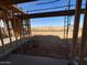 Under construction, view of the backyard from inside at 47476 W Kenner Dr, Maricopa, AZ 85139