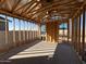 Home's interior under construction, framing visible at 47476 W Kenner Dr, Maricopa, AZ 85139