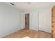 Bedroom boasting hardwood floors, natural light, and closet at 5373 W Dublin Ct, Chandler, AZ 85226