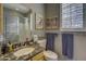 Bathroom with granite vanity and updated fixtures at 6788 E Nightingale Star Cir, Scottsdale, AZ 85266