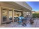 Covered patio with comfortable seating and views at 6788 E Nightingale Star Cir, Scottsdale, AZ 85266