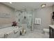 Spa-like bathroom featuring a tub, walk-in shower, and neutral color palette at 7018 E Wilshire Dr, Scottsdale, AZ 85257