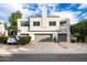 Two-story building with attached garages and landscaping at 7710 E Gainey Ranch Rd # 152, Scottsdale, AZ 85258