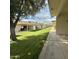 Exterior view of backyard and walkway, with trees at 8260 E Keats Ave # 500, Mesa, AZ 85209