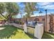 Outdoor kitchen featuring a built-in grill, ample counter space, and manicured landscaping at 8407 E Rancho Vista Dr, Scottsdale, AZ 85251