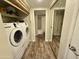 Convenient laundry room with washer and dryer, and extra storage at 850 S River Dr # 1002, Tempe, AZ 85281