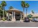 Community center entrance with covered portico and ample parking at 8700 E University Dr # 2216, Mesa, AZ 85207