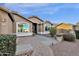 Attractive single story home with desert landscaping, and a brick walkway at 924 S Evergreen St, Chandler, AZ 85225