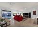 Bright living room with tile floors, ceiling fans, and sliding glass doors to the backyard at 924 S Evergreen St, Chandler, AZ 85225