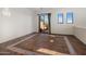 Bright bonus room with balcony access and patterned tile flooring at 9290 E Thompson Peak Pkwy # 444, Scottsdale, AZ 85255