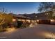 Exterior shot of a luxurious single-Gathering home with beautiful southwestern architectural features at 9290 E Thompson Peak Pkwy # 444, Scottsdale, AZ 85255