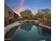 Gorgeous swimming pool with tiled hot tub and stone accents in a private backyard setting at 9290 E Thompson Peak Pkwy # 444, Scottsdale, AZ 85255