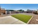 Artificial turf and a storage shed in the backyard at 9477 W Frank Ave, Peoria, AZ 85382