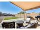 Covered patio, artificial turf, and BBQ grill at 9477 W Frank Ave, Peoria, AZ 85382