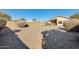 Large backyard with gravel and a block wall at 9477 W Frank Ave, Peoria, AZ 85382