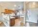 Kitchen with wood cabinets, stainless steel appliances, and a sink at 9477 W Frank Ave, Peoria, AZ 85382