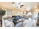 Cozy living room featuring comfortable seating and natural light at 9477 W Frank Ave, Peoria, AZ 85382