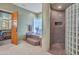 Spa-like bathroom with a large shower, a soaking tub, and glass block accents at 10040 E Happy Valley Rd # 595, Scottsdale, AZ 85255