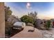 Built-in outdoor kitchen with grill and sink; perfect for summer fun at 11077 E Cinder Cone Trl, Scottsdale, AZ 85262