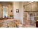 Bathroom with tiled shower, vanity, and toilet at 11077 E Cinder Cone Trl, Scottsdale, AZ 85262