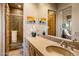 Bathroom with a single sink vanity and shower at 11077 E Cinder Cone Trl, Scottsdale, AZ 85262