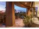 Stone patio with desert landscaping offering stunning views at 11077 E Cinder Cone Trl, Scottsdale, AZ 85262