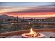 Enjoy breathtaking sunset views from this patio firepit at 11077 E Cinder Cone Trl, Scottsdale, AZ 85262