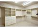 Spacious walk-in closet, built-in shelves, and drawers at 11077 E Cinder Cone Trl, Scottsdale, AZ 85262